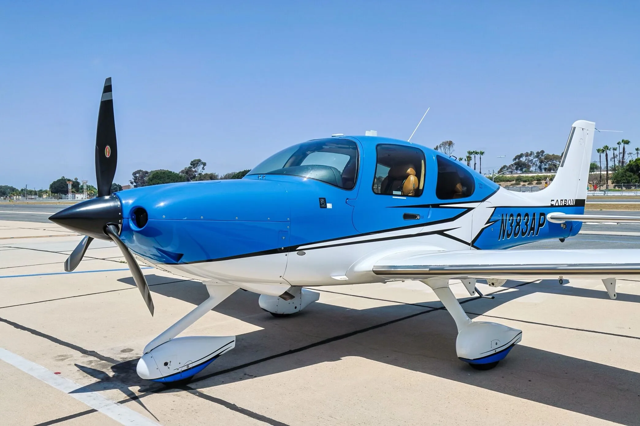 Exterior view of a 2018 Cirrus SR22-G6 TURBO, N383AP.