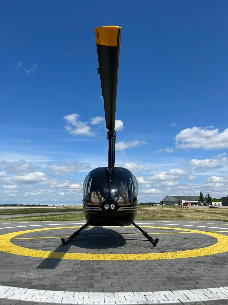 Exterior view of a 2009 ROBINSON R44 RAVEN II, OK-TEW.