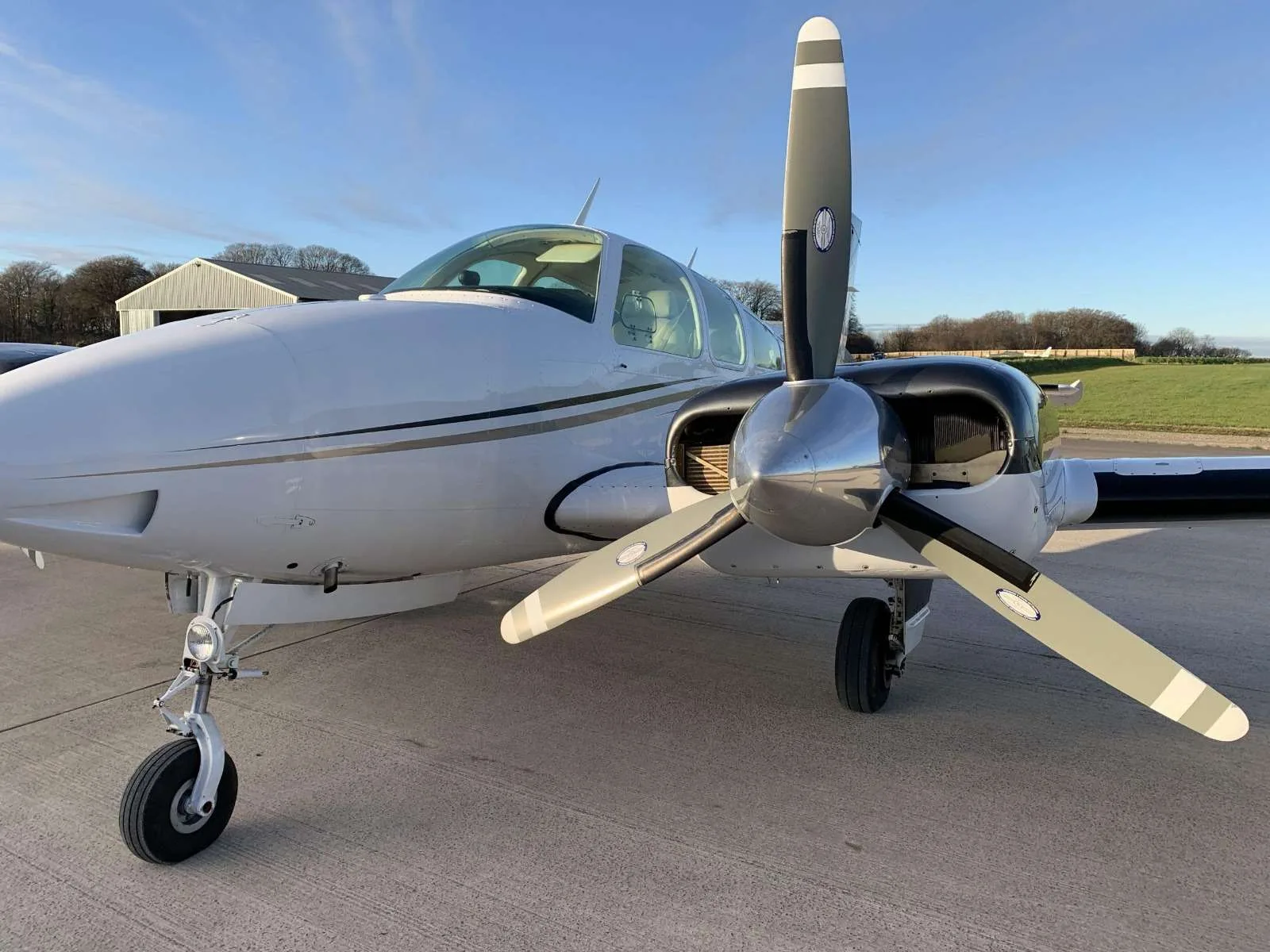 Exterior view of a 1976 Beechcraft Baron B55, G-DGST.