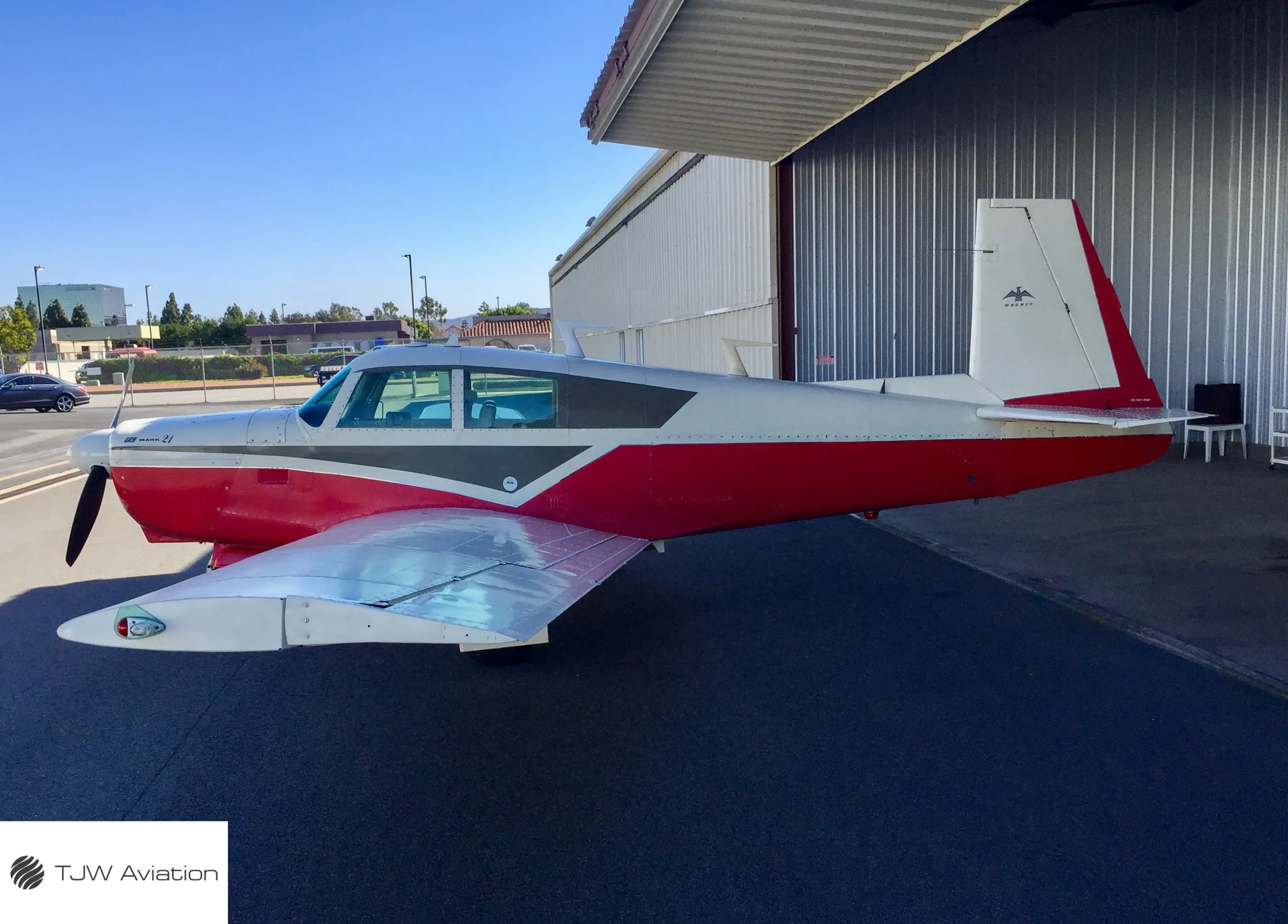 Exterior view of a 1966 Mooney M20C, N2587W.