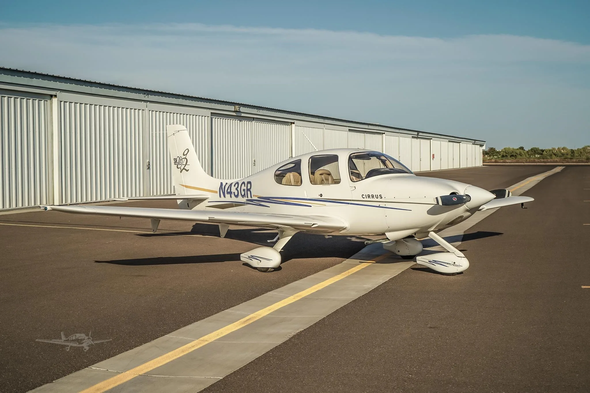 Exterior view of a 2005 CIRRUS SR20-G2, N43GR.