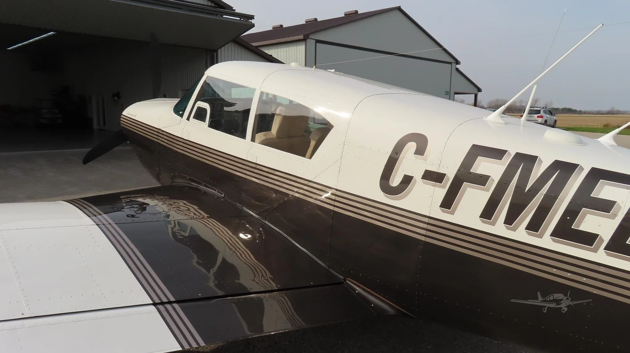 Exterior view of a 1960 PIPER COMANCHE 180, C-FMEB.