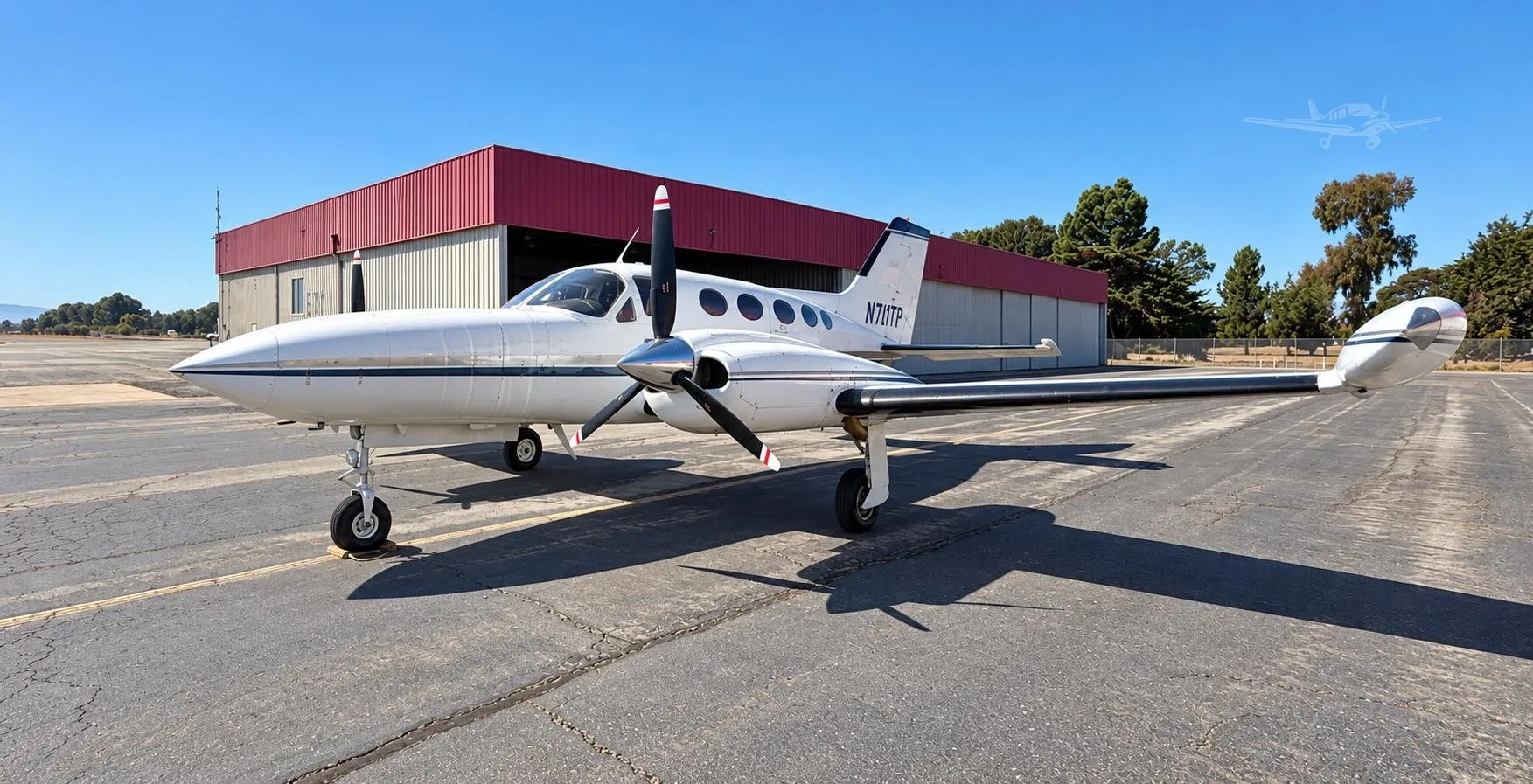 Exterior view of a 1973 CESSNA 421B, N711TP.