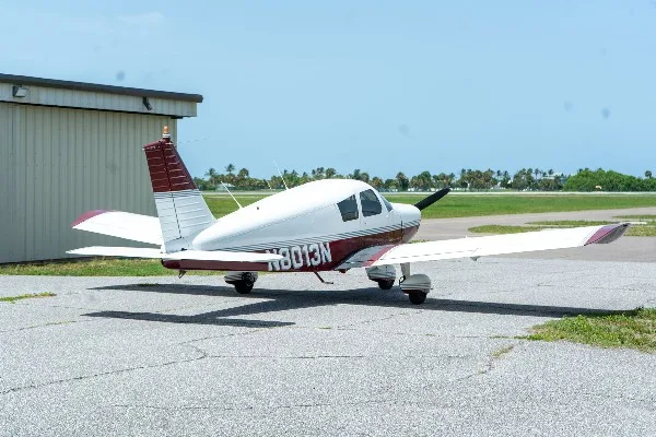 Exterior view of a 1968 Piper Cherokee 140, N8013N.
