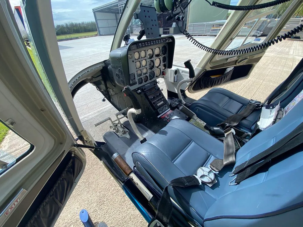 Cockpit and instrument panel of a 1980 Bell 206B-3 JetRanger.