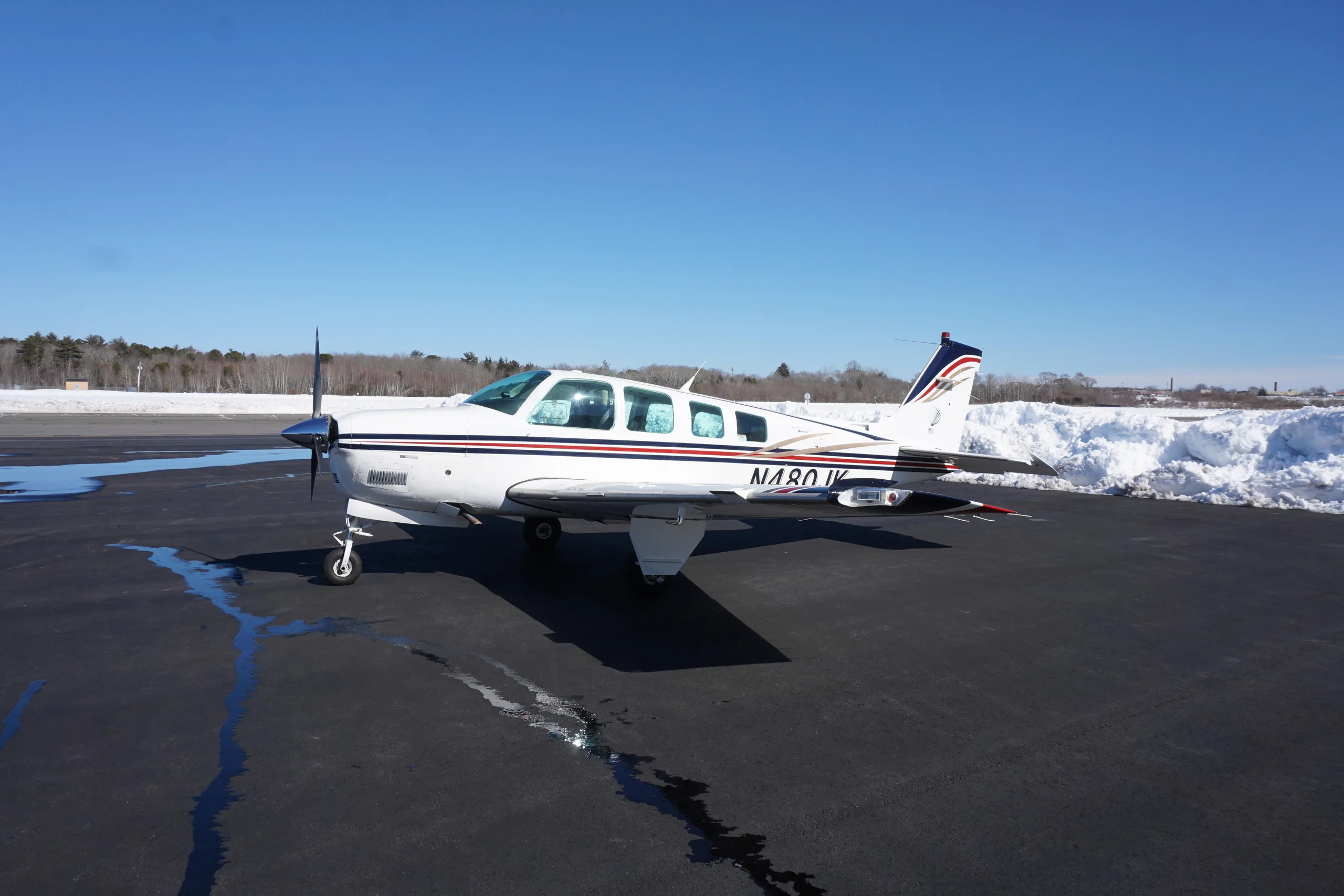 Exterior view of a 1997 Beechcraft A36 Bonanza.