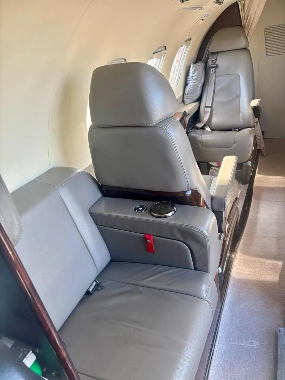 Cabin interior of a 2016 EMBRAER PHENOM 100E.