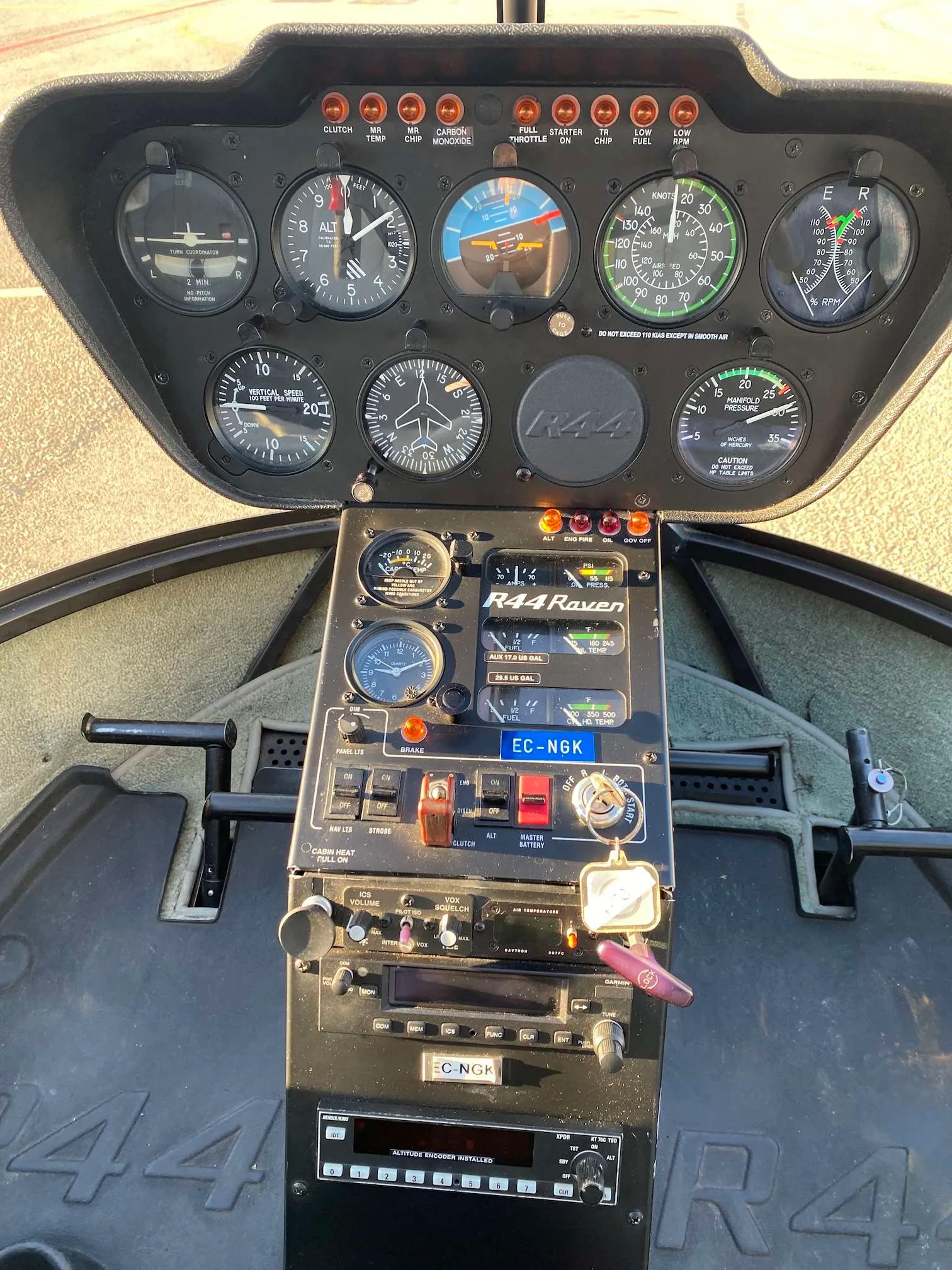 Cockpit and instrument panel of a 2002 Robinson R44 Raven I.