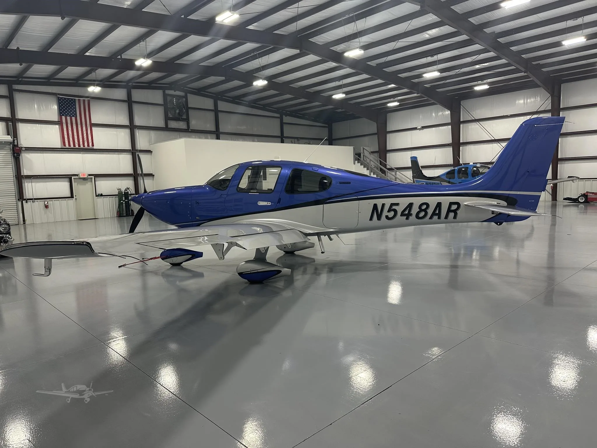 Exterior view of a 2025 CIRRUS SR20-G7, N548AR.