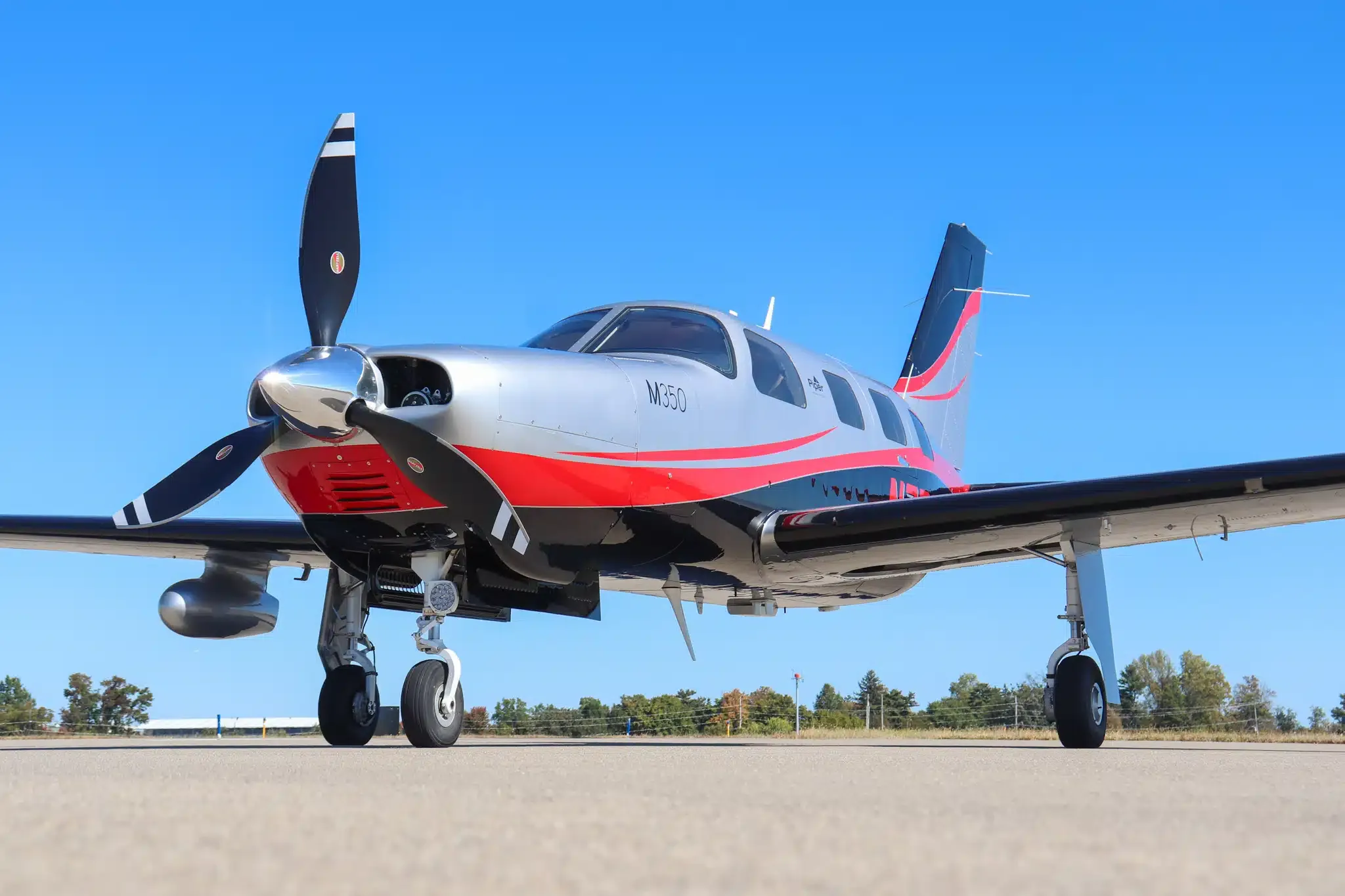 Exterior view of a 1983 Piper Turbo Saratoga, N4299X.
