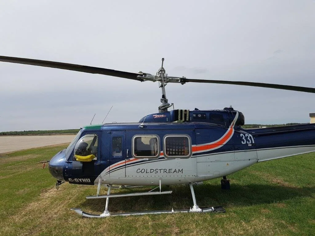Exterior view of a 1975 Bell 205A-1 SN30177 C-GYHU | Hopkinson Luxury Aircraft Sales, C-GYHU.