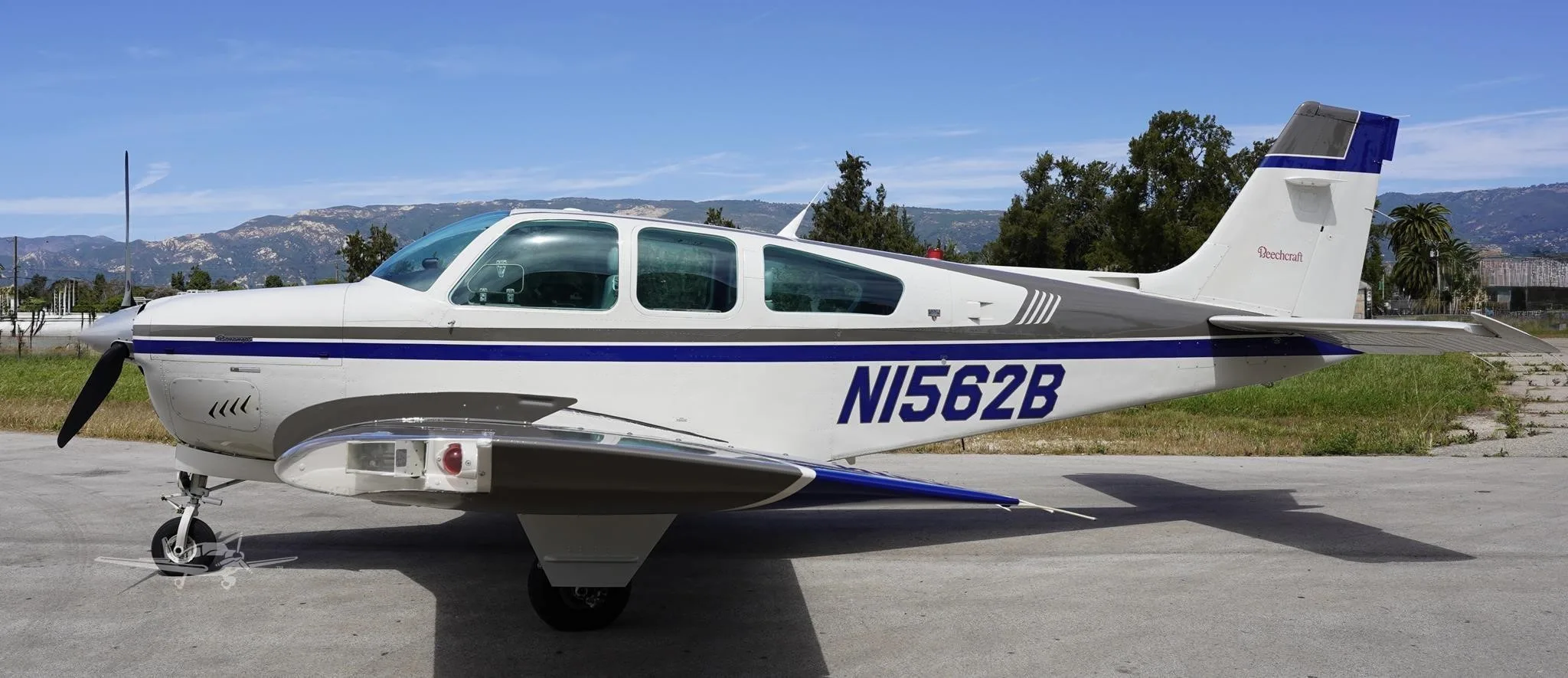 Exterior view of a 1989 BEECHCRAFT F33A BONANZA, N1562B.