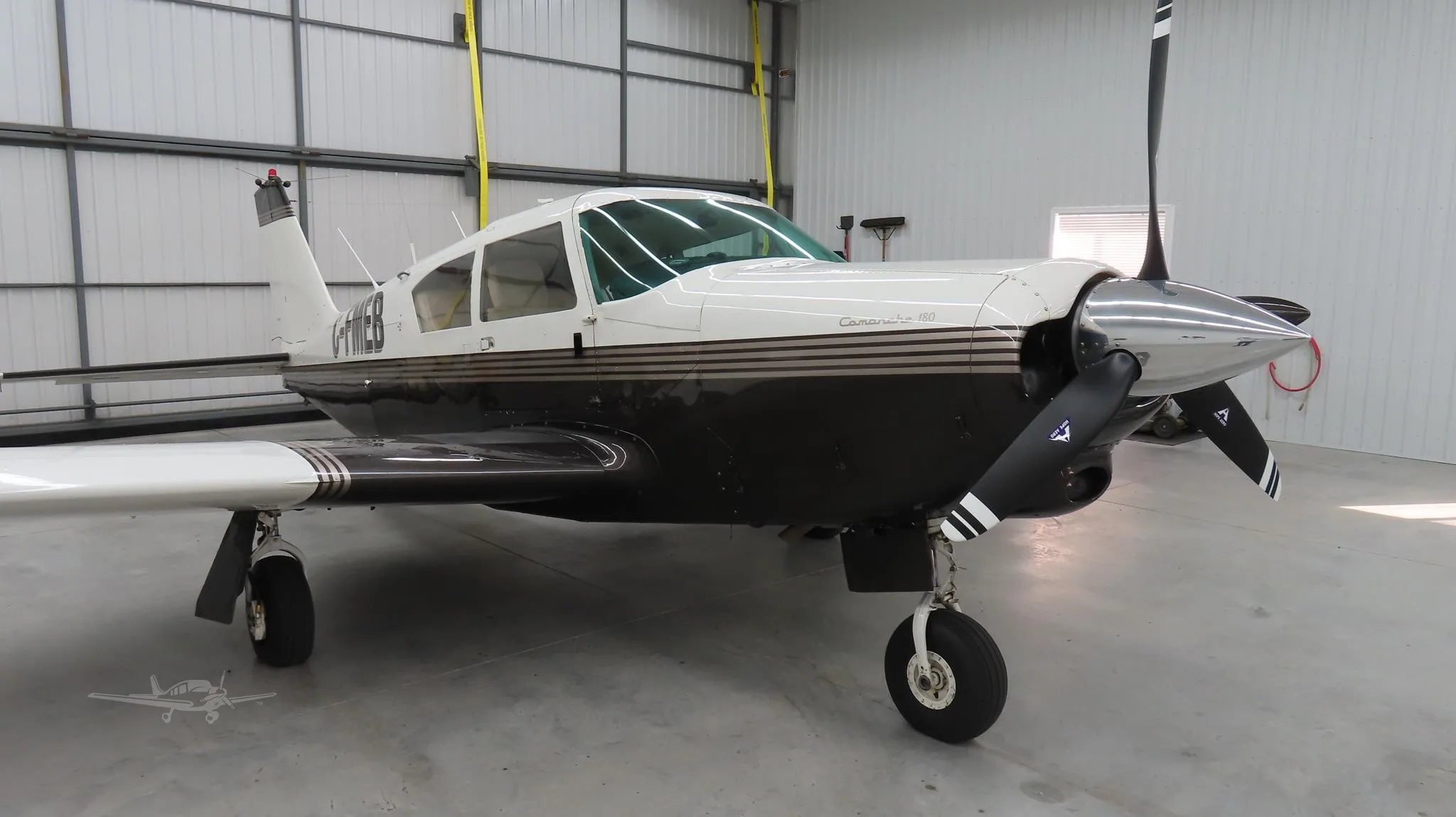 Exterior view of a 1960 PIPER COMANCHE 180, C-FMEB.
