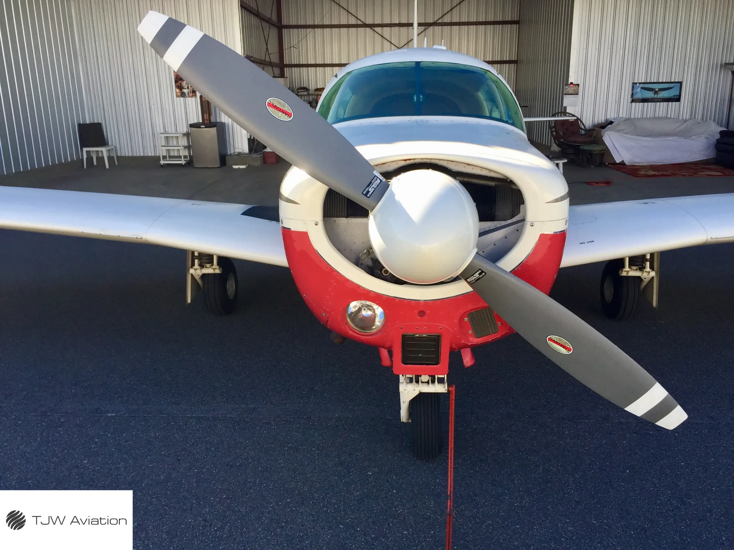 Exterior view of a 1966 Mooney M20C, N2587W.