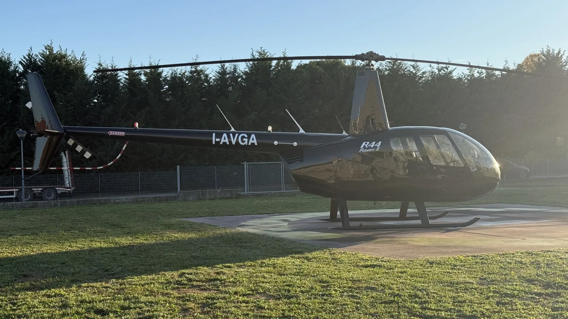 Exterior view of a 2010 Robinson R44 Raven II, I-AVGA.