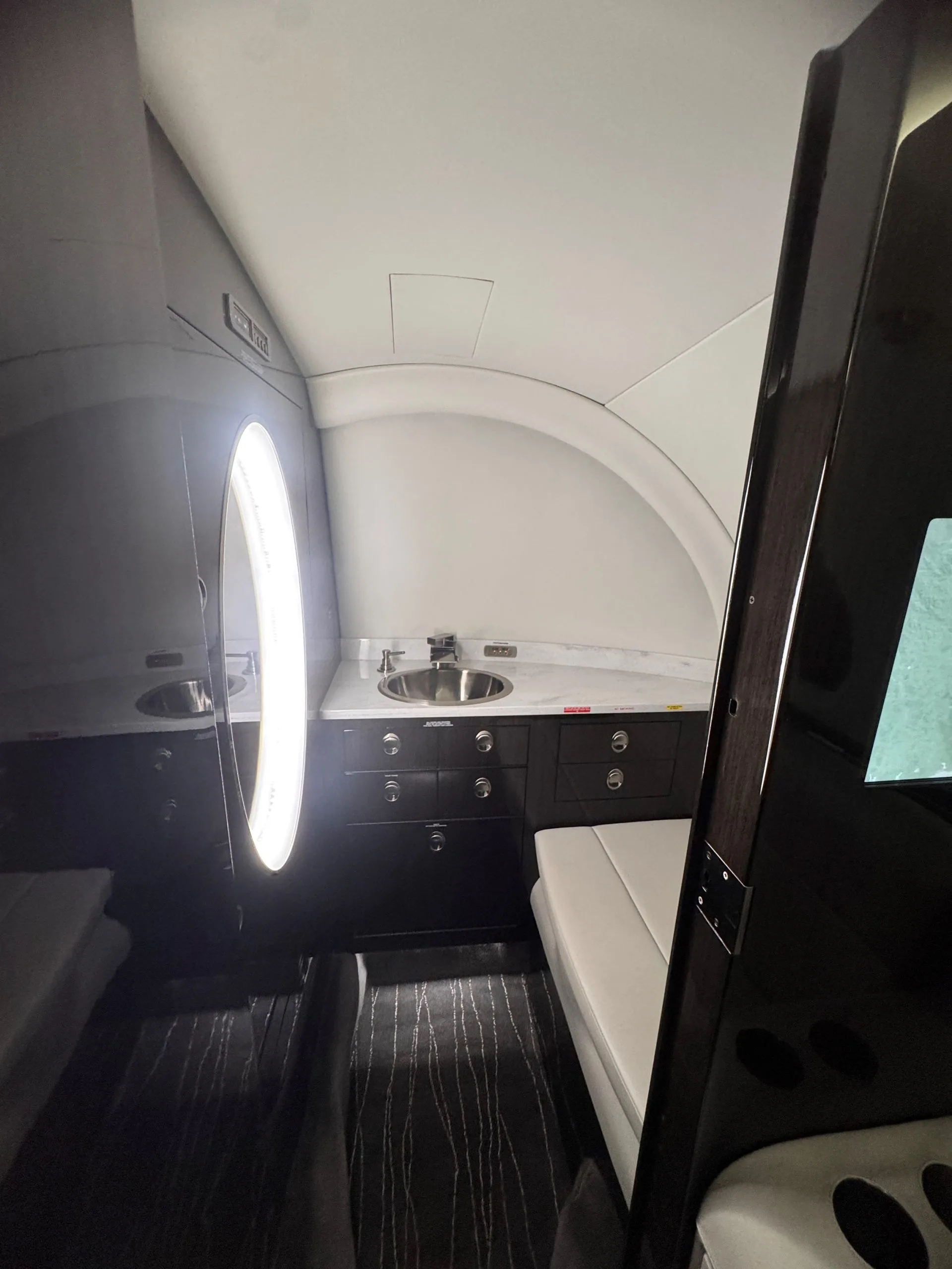 Cabin interior of a 2009 Hawker 900XP.
