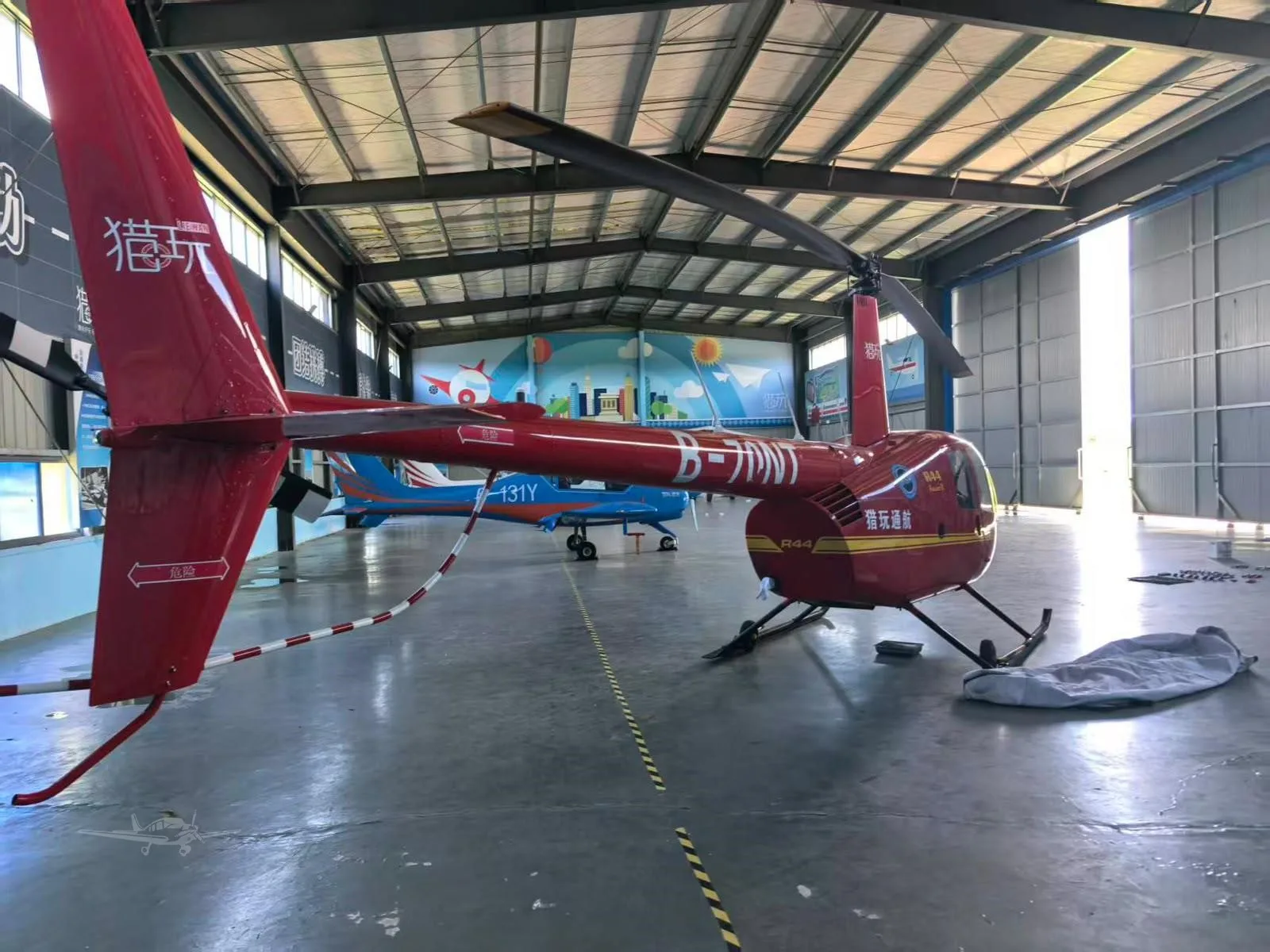 Exterior view of a 2016 ROBINSON R44 RAVEN II.