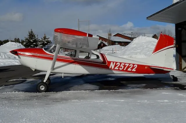 Exterior view of a 1963 Cessna 180F, N25722.