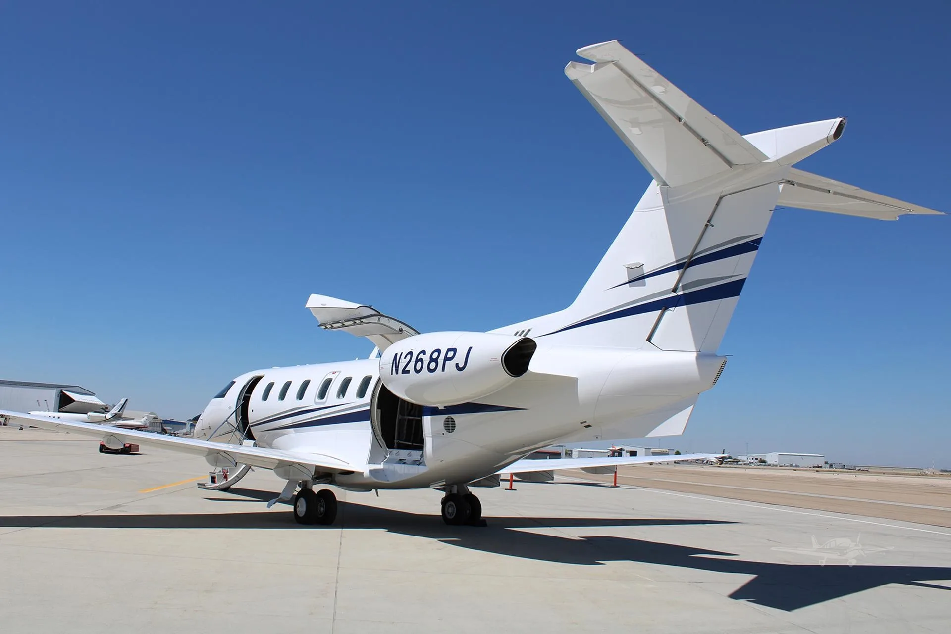 Exterior view of a 2022 PILATUS PC-24, N268PJ.
