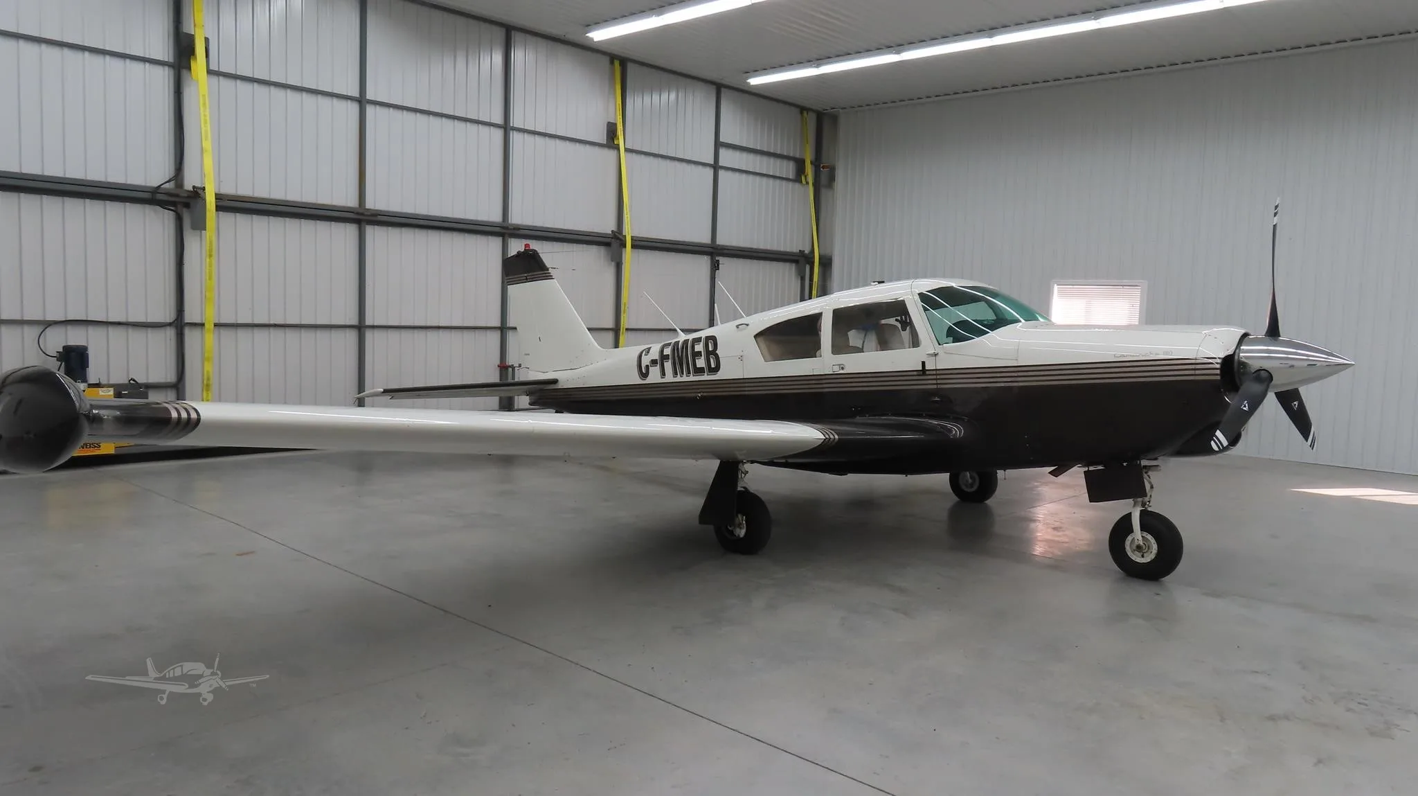 Exterior view of a 1960 PIPER COMANCHE 180, C-FMEB.