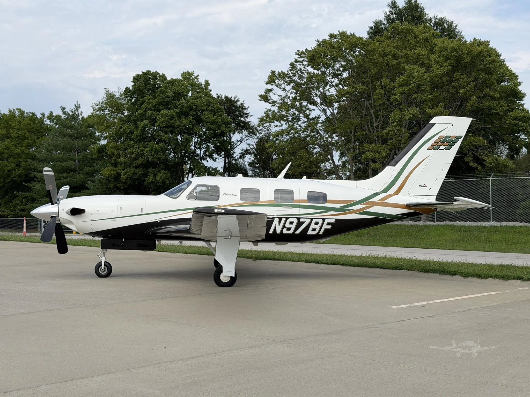 Exterior view of a 2006 PIPER MERIDIAN, N97BF.
