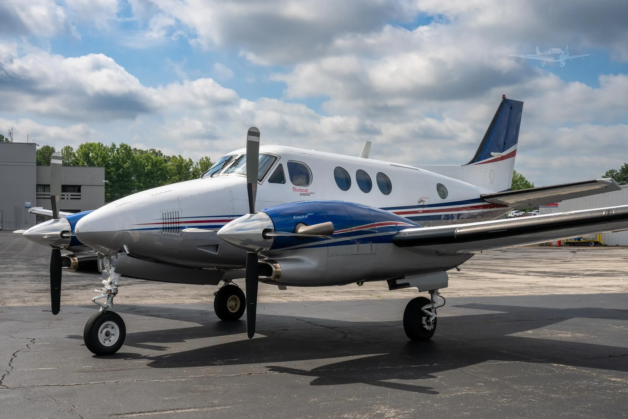 Exterior view of a 2009 BEECHCRAFT KING AIR C90GTI, N6211J.