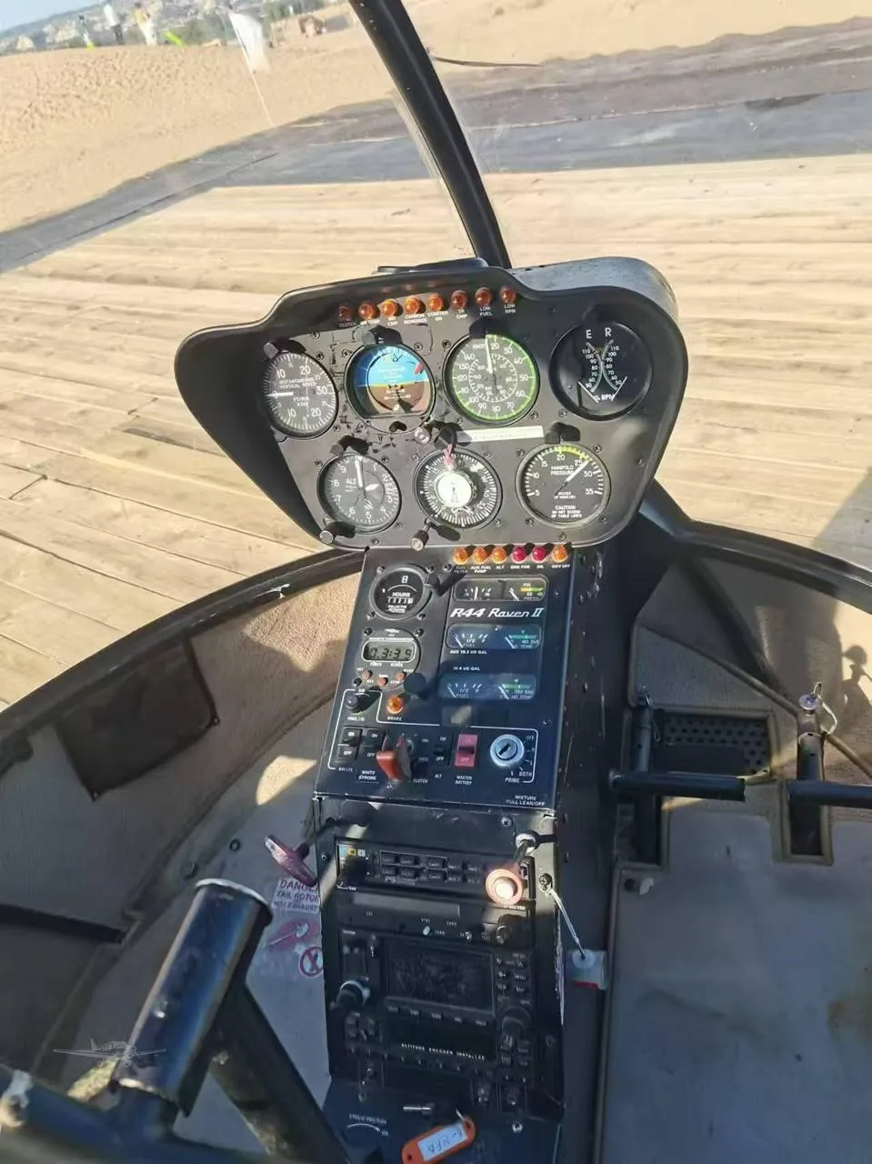 Cockpit and instrument panel of a 2006 ROBINSON R44 RAVEN II.