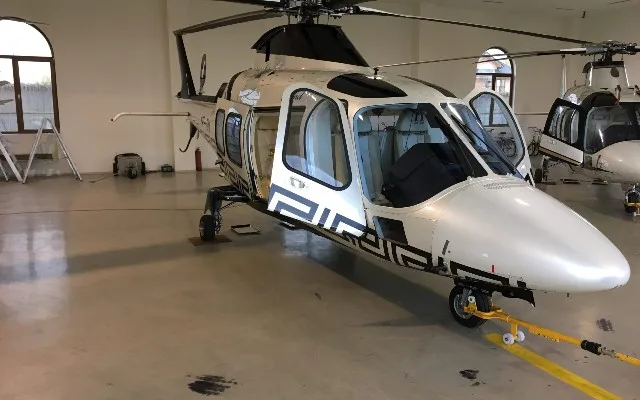 Exterior view of a 2010 Agusta A109 Grand, YR-TIM.