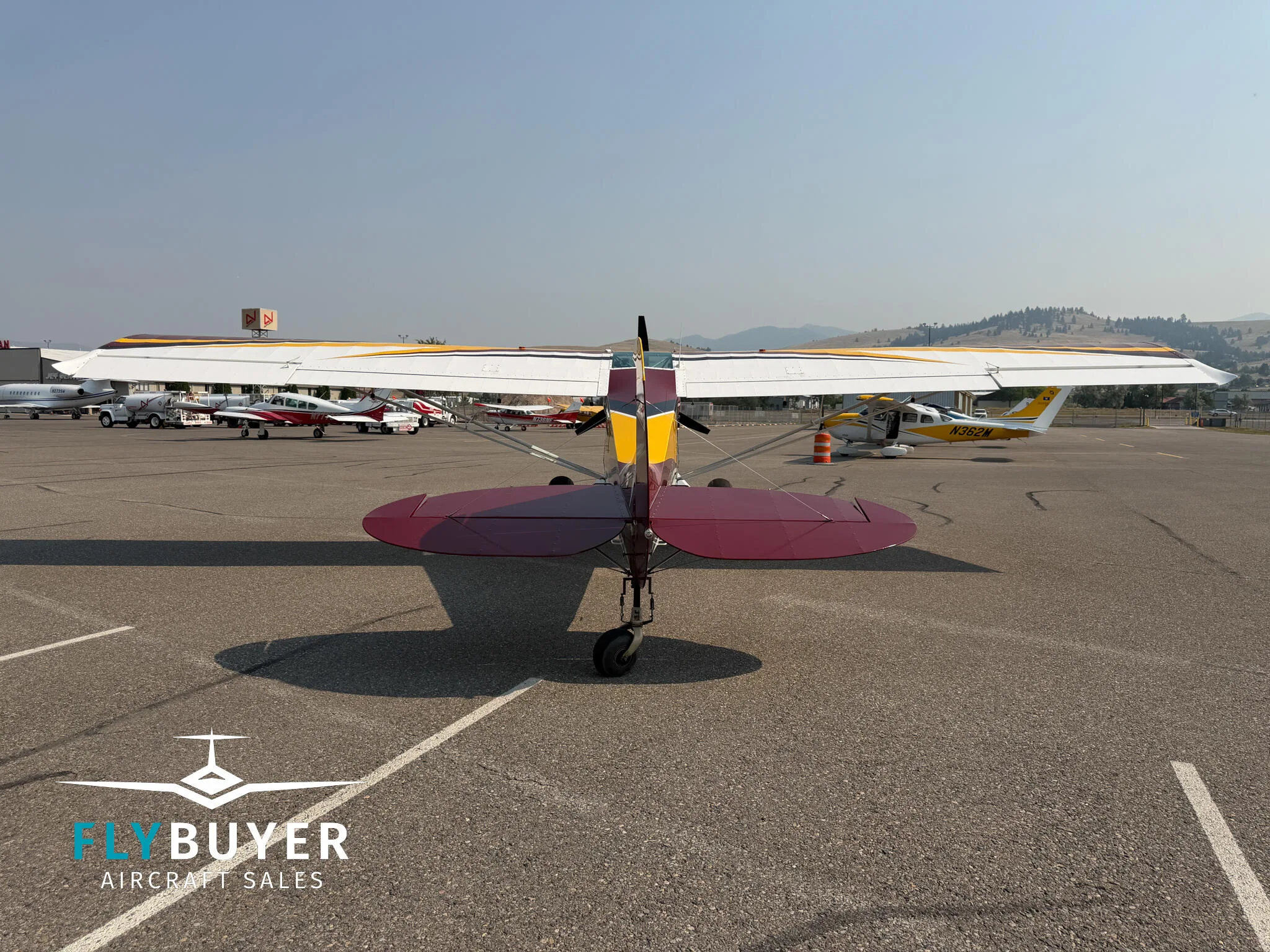 Exterior view of a 2012 Aviat A-1C-200 Husky.