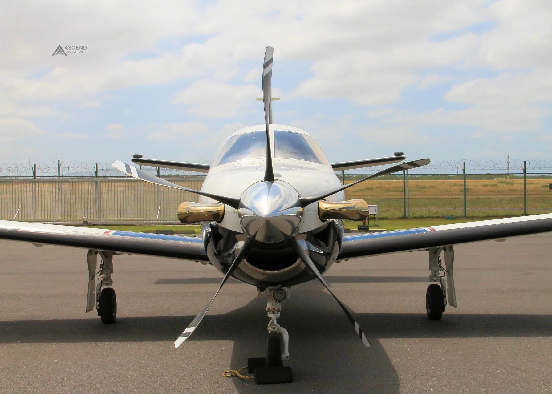Exterior view of a 2006 DAHER TBM 700C2, ZS-FAW.
