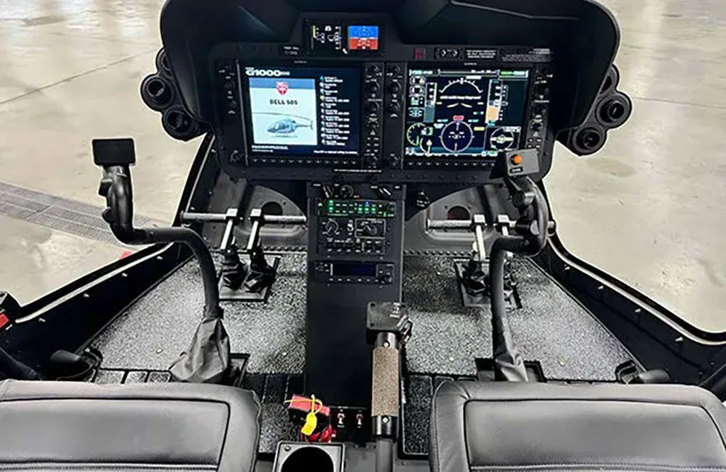 Cockpit and instrument panel of a 2026 Bell 505 Jet Ranger X.