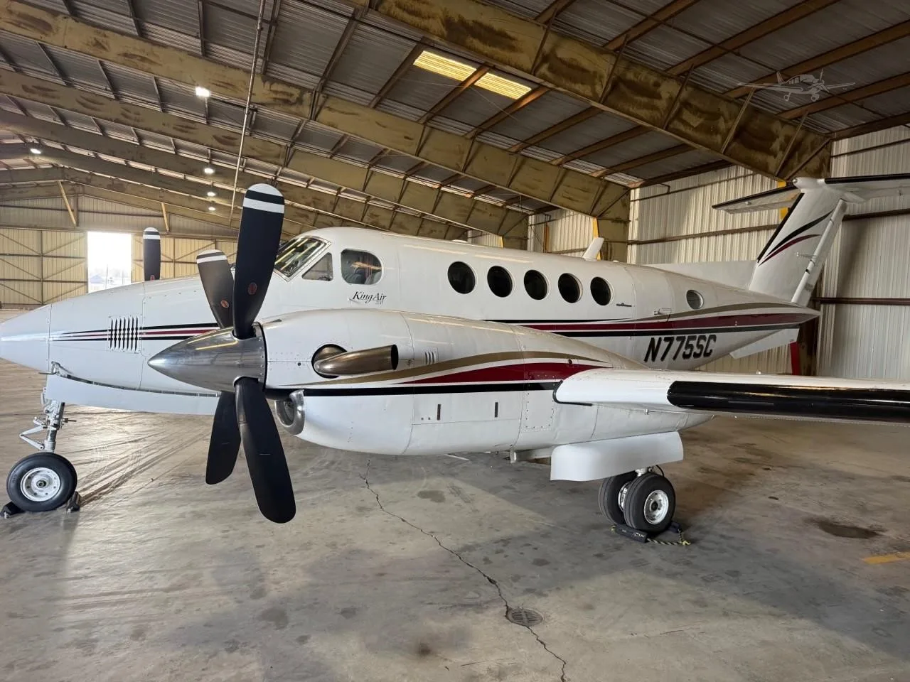 Exterior view of a 1980 BEECHCRAFT KING AIR 200, N775SC.