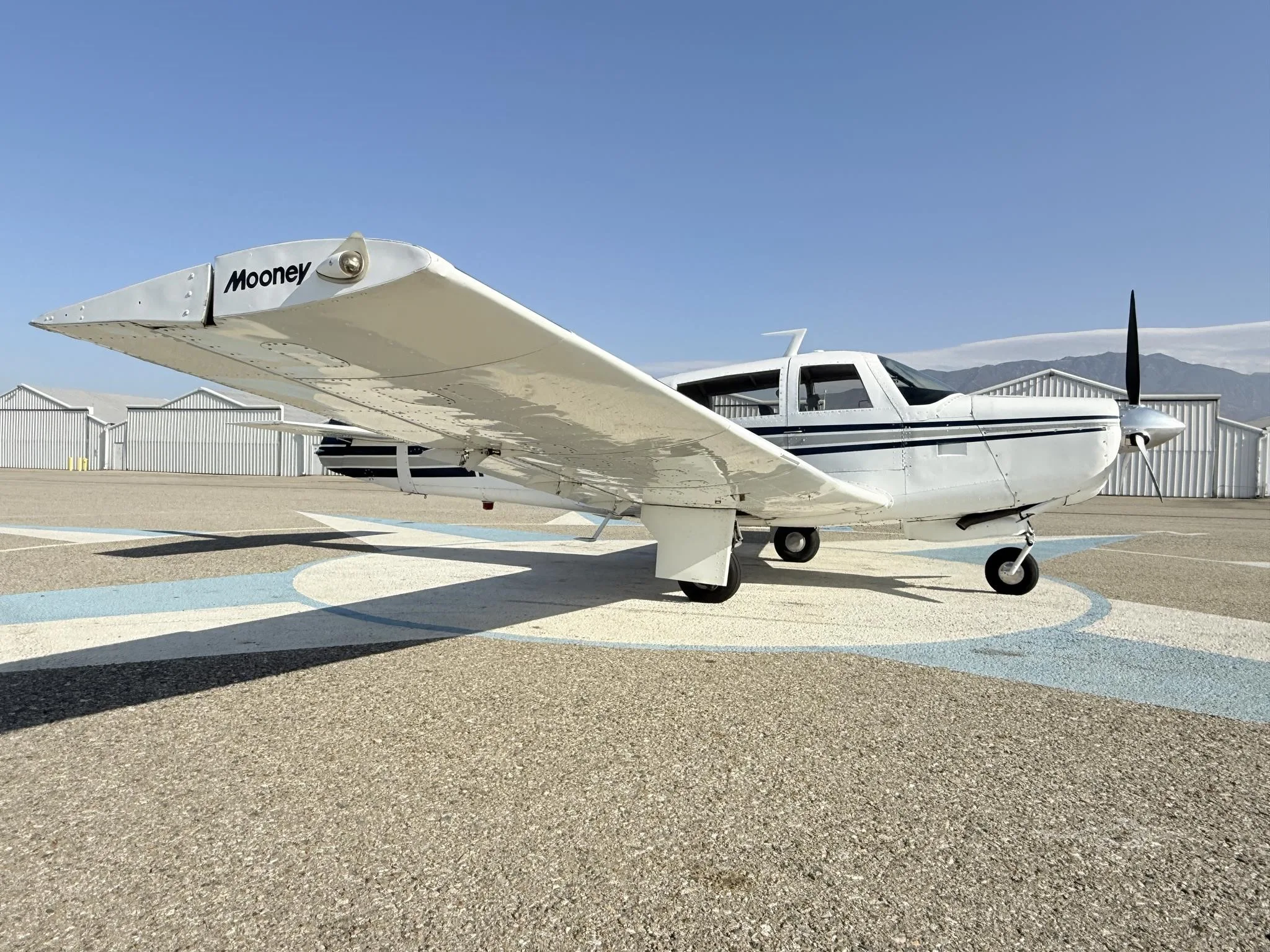 Exterior view of a 1970 MOONEY M20F, N76HP.