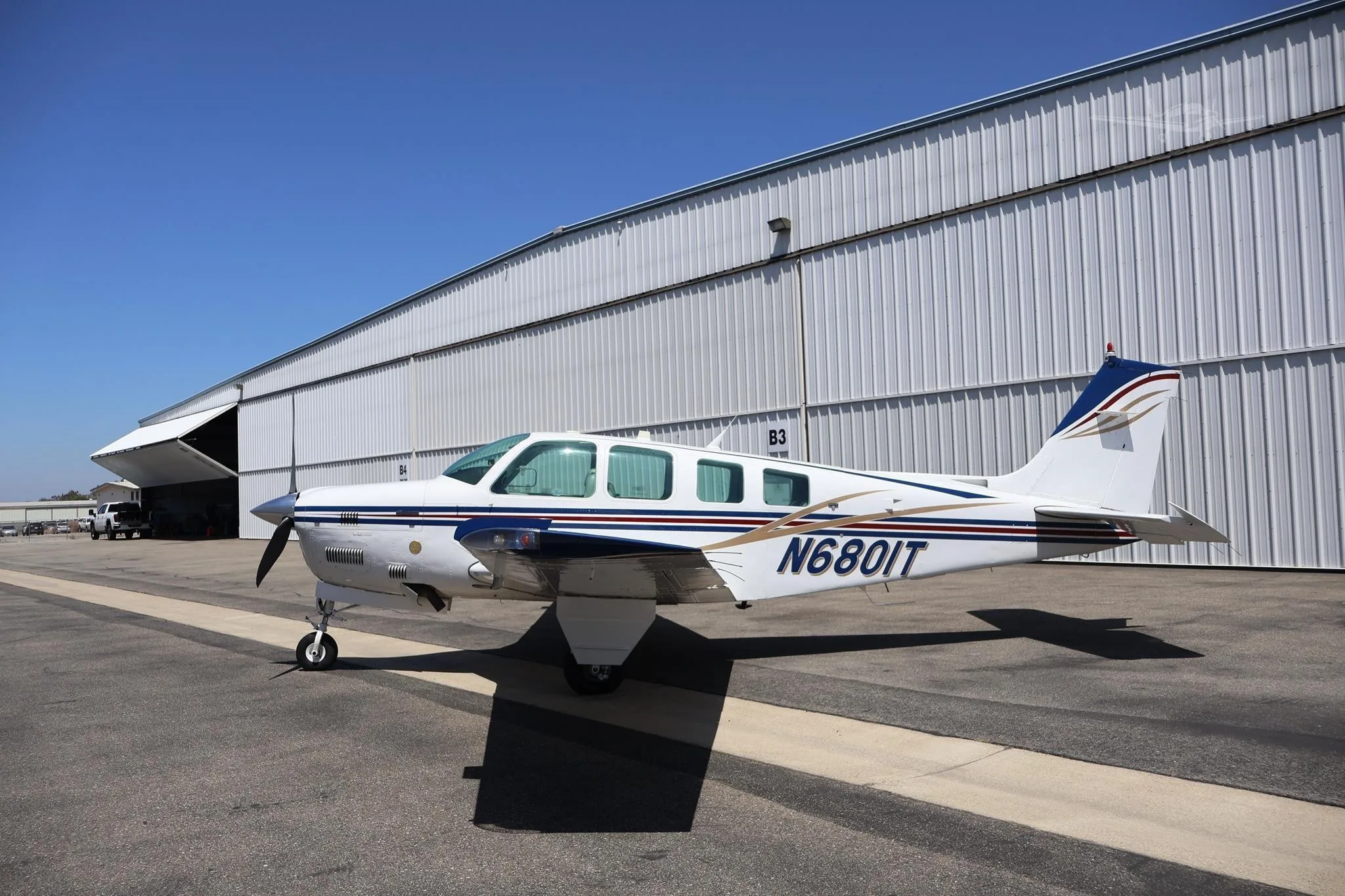 Exterior view of a 1984 BEECHCRAFT B36TC BONANZA, N6801T.