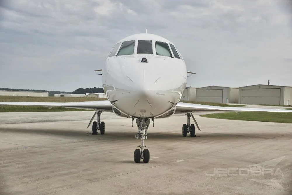Exterior view of a 2006 DASSAULT FALCON 2000LX, N797PG.