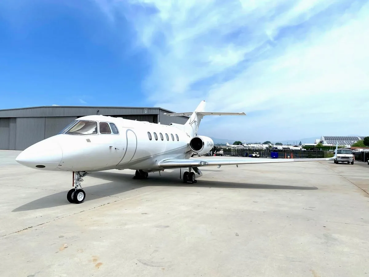 Exterior view of a 2008 Hawker 850XP, T7-TUN.