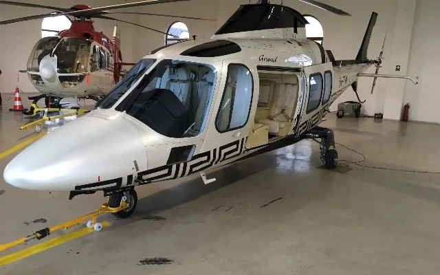 Exterior view of a 2010 Agusta A109 Grand, YR-TIM.