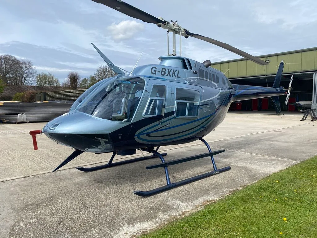 Exterior view of a 1980 Bell 206B-3 JetRanger, G-BXKL.