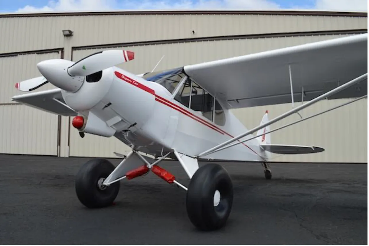 Exterior view of a 1955 Piper PA-18-150, N1662P.