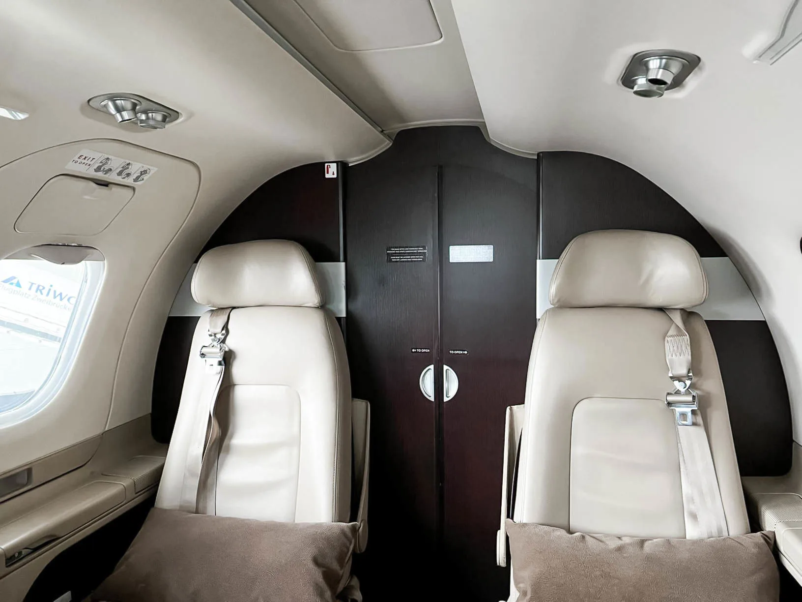 Cabin interior of a 2010 Embraer Phenom 100.