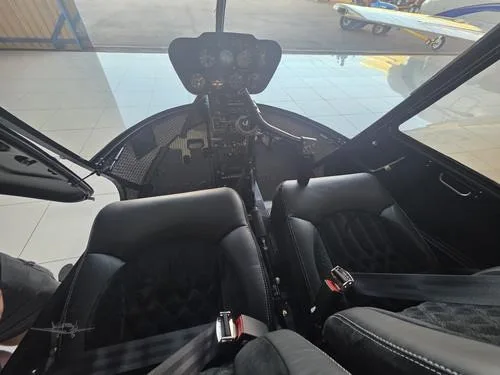 Cockpit and instrument panel of a 2007 ROBINSON R44 RAVEN II.