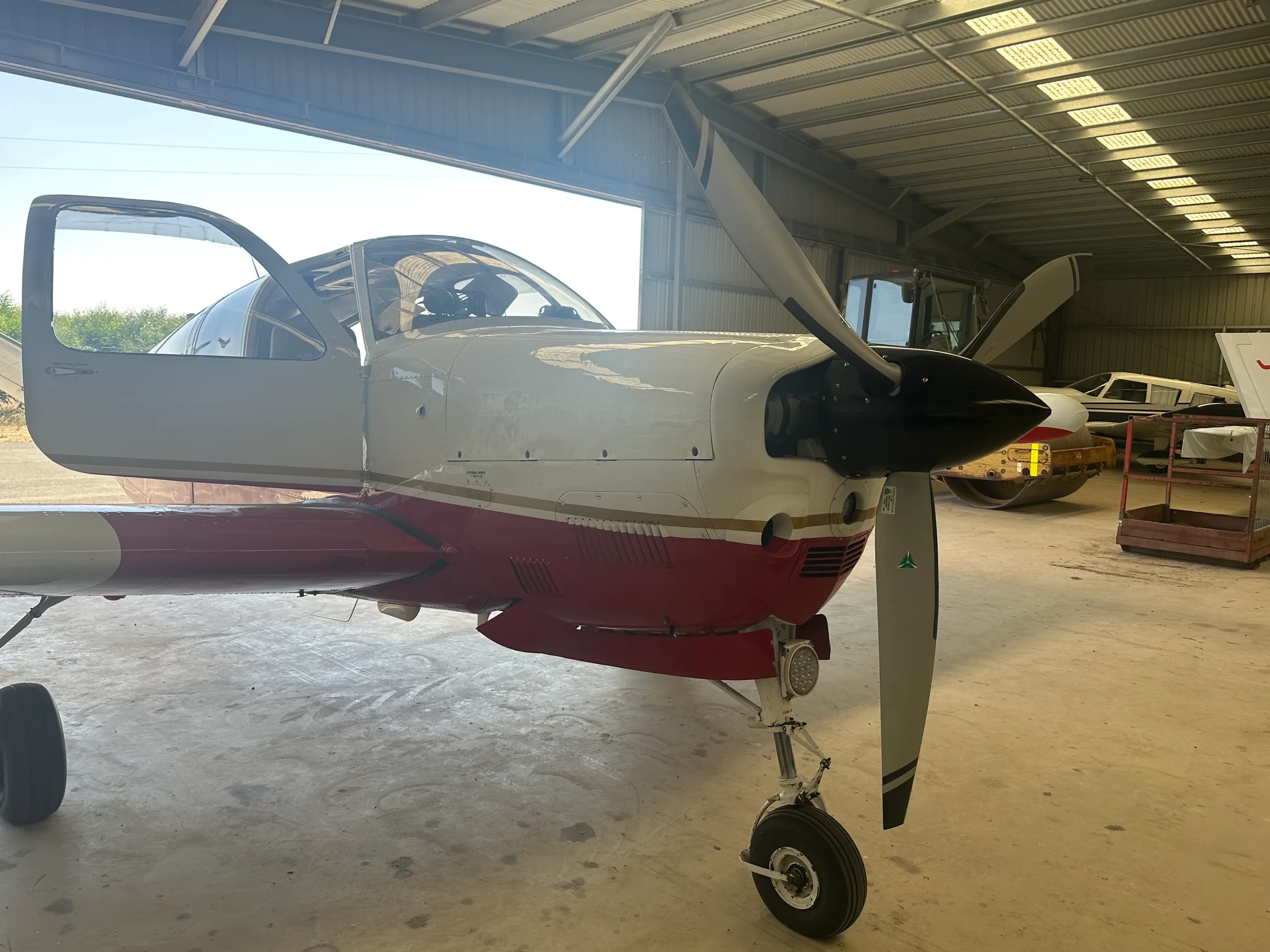 Exterior view of a 1966 Beechcraft Bonanza V35, VH-CFV.