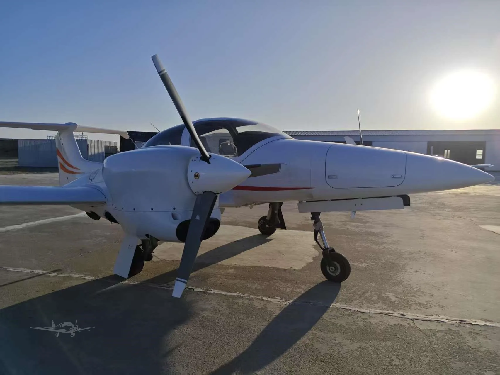 Exterior view of a 2011 DIAMOND DA42 NG.