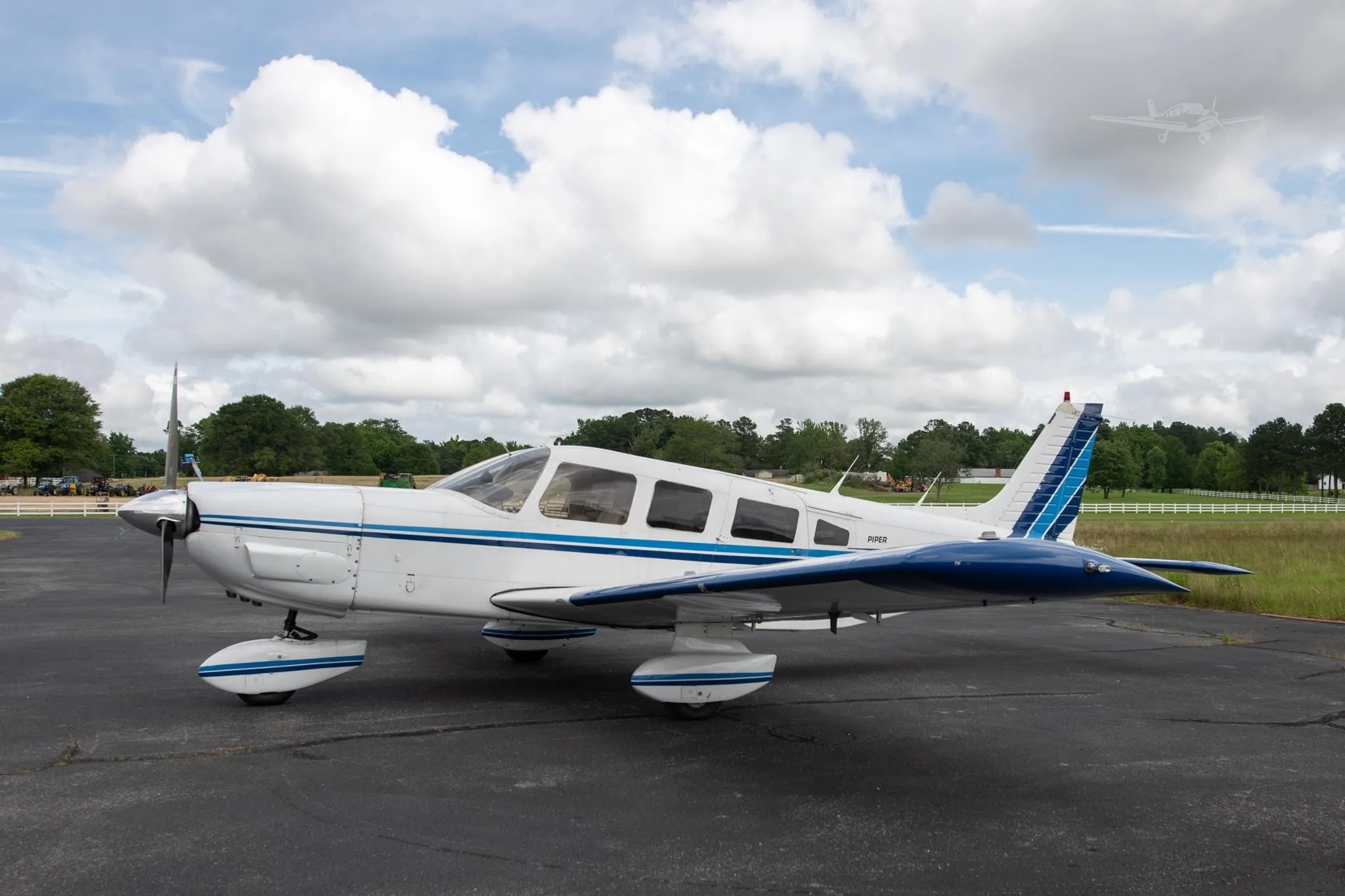 Exterior view of a 1977 PIPER CHEROKEE 6/300, N2617M.