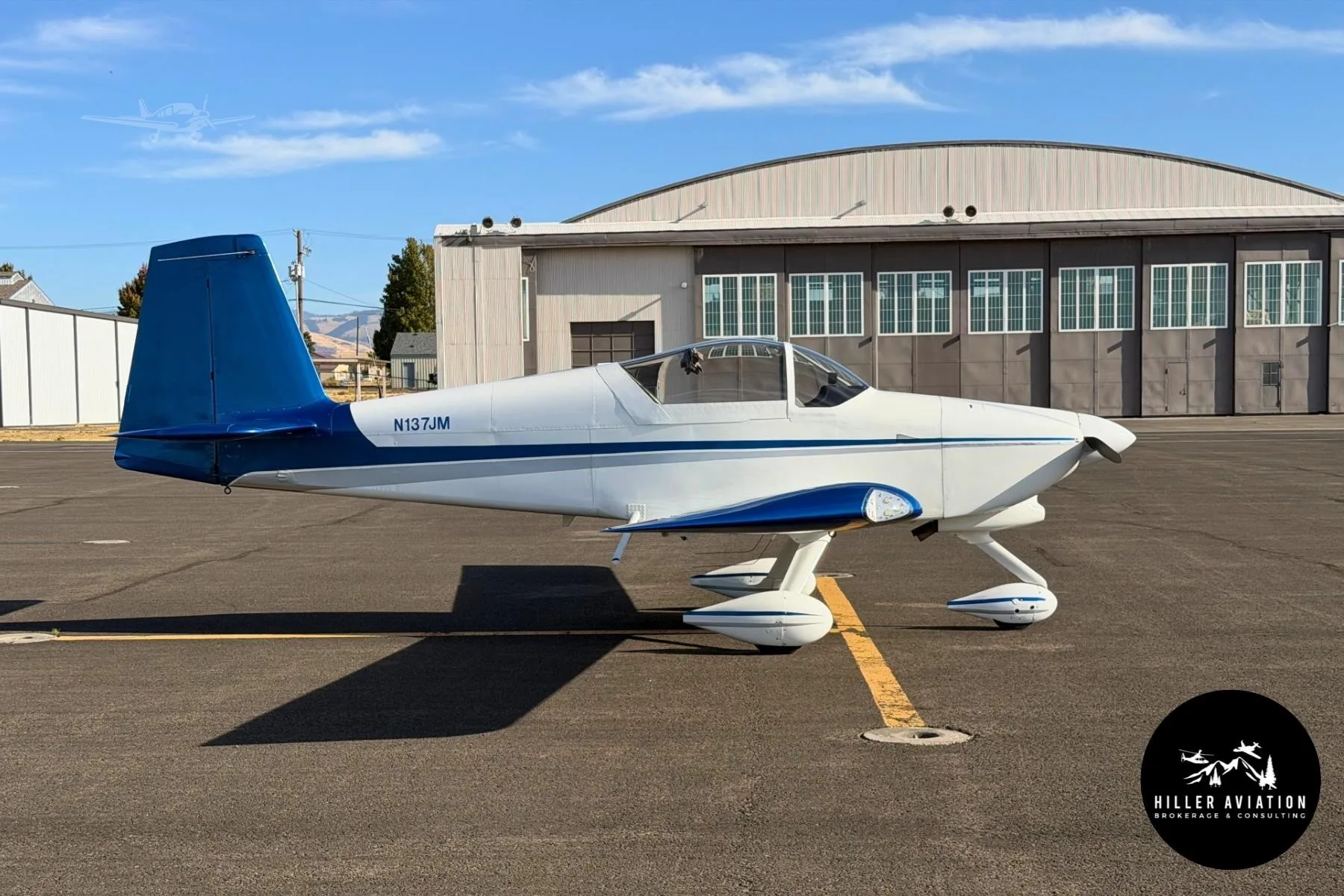Exterior view of a 2006 VANS RV-9A, N137JM.