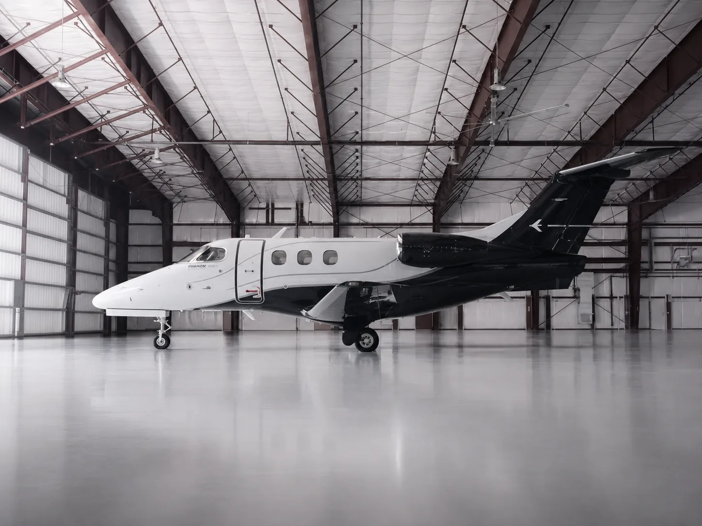 Marketing image of a 2012 Embraer Phenom 100.