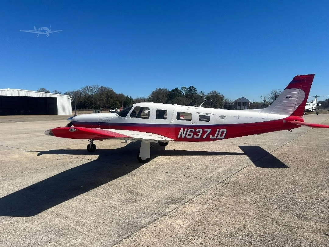 Exterior view of a 2003 PIPER SARATOGA II HP, N637JD.