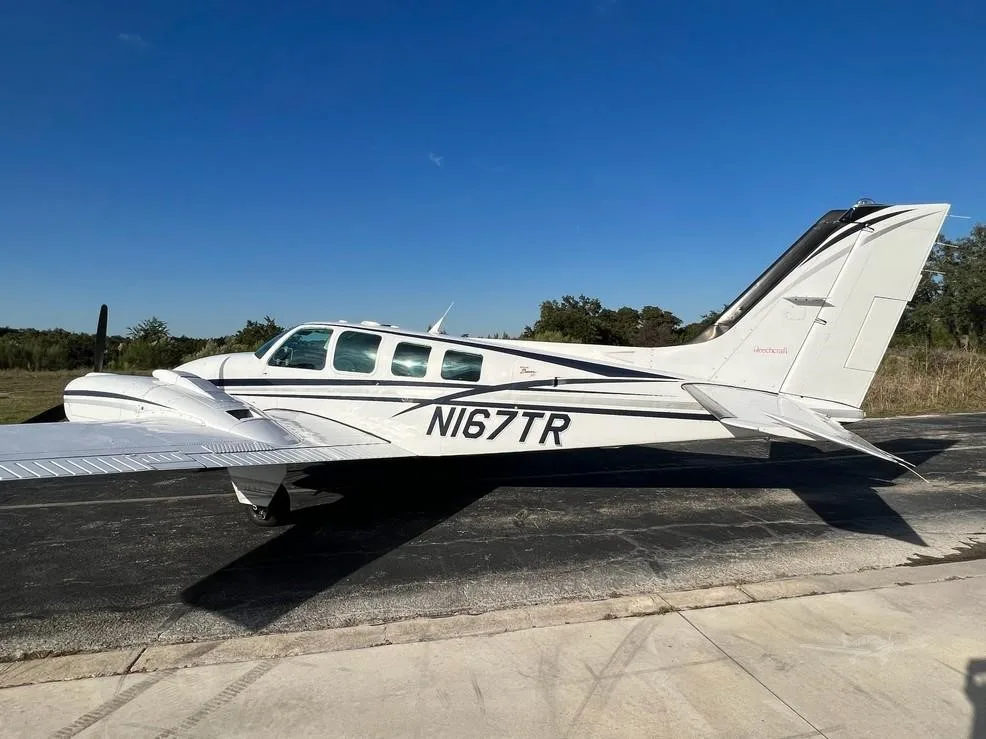 Exterior view of a 1998 BEECHCRAFT 58 BARON, N167TR.