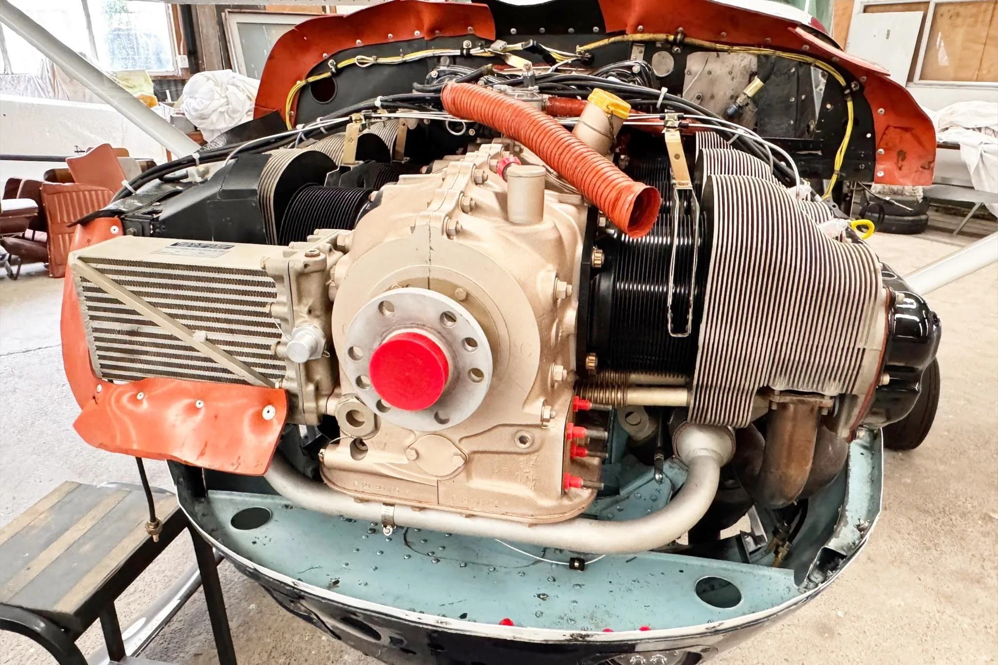 Engine detail of a 1964 CESSNA U206 SUPER SKYWAGON.