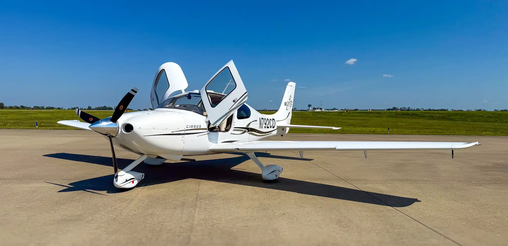 Exterior view of a 2014 Cirrus SR22T G5 GTS, N308AW.